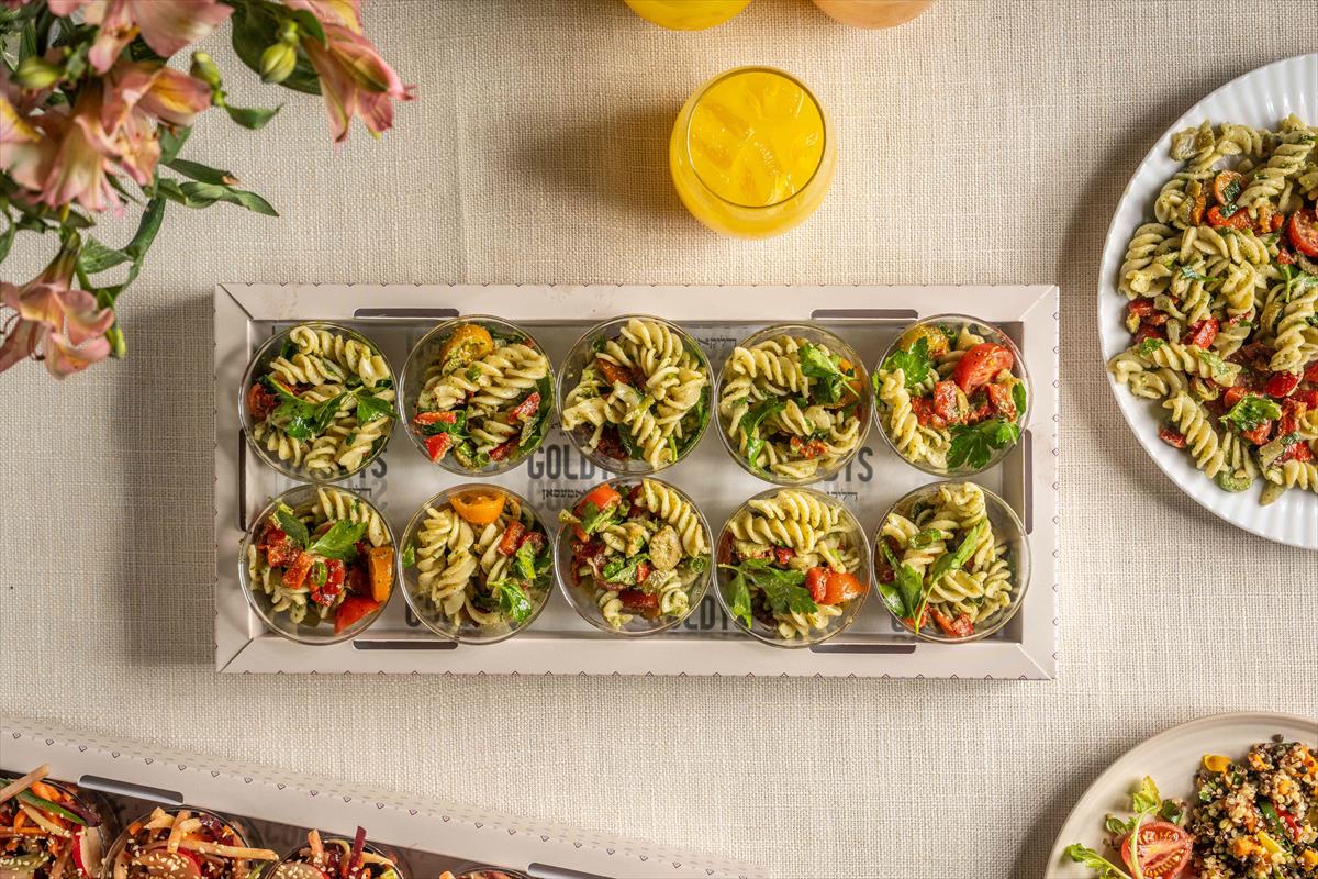 A tray of pasta salad