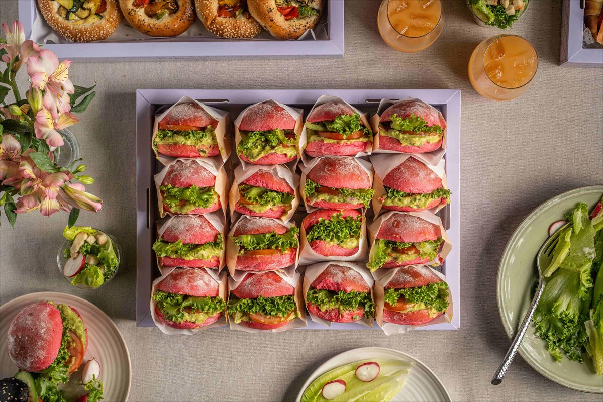 A tray of bite-size rolls with Avocado & Egg salad