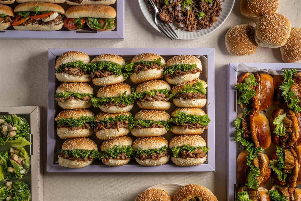 A tray of Brioches bite filled with Asado