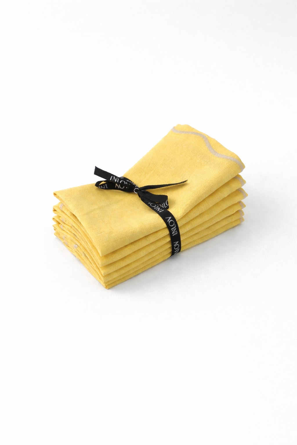 מפית פשתן צהוב מסגרת פס רקמה בז׳