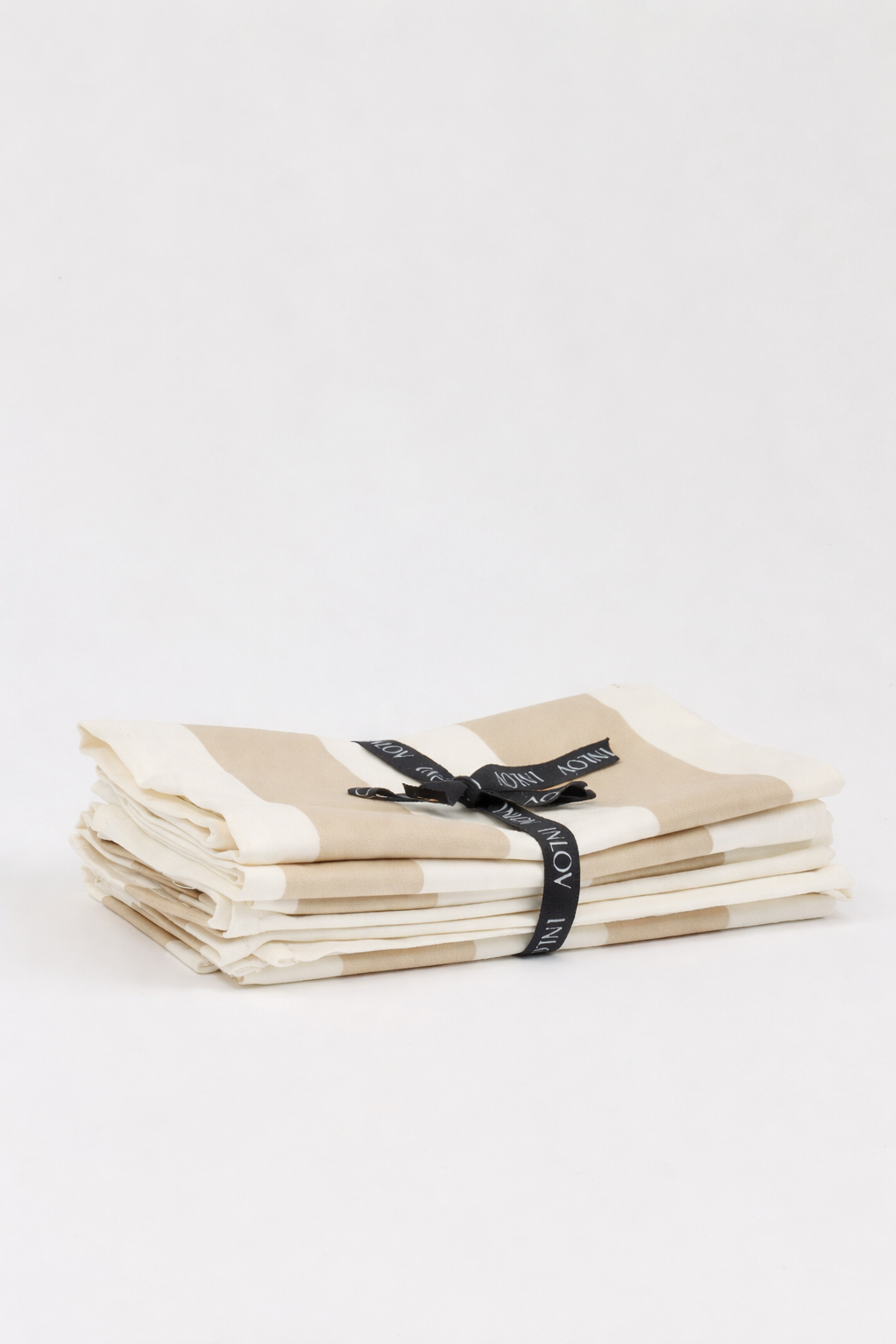 מפית פסים בז׳ בהיר