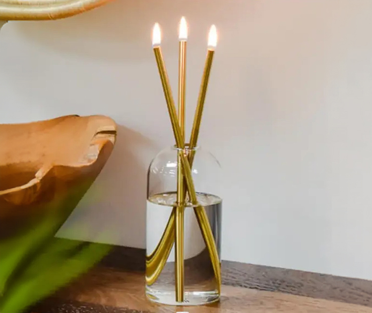 סט נרות זהב בבקבוק UNO MAS